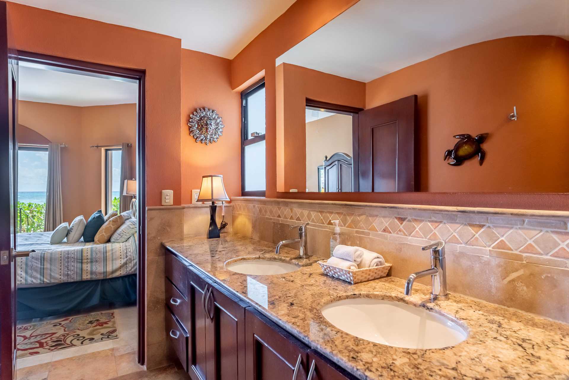 Master bath with glass shower, double sinks