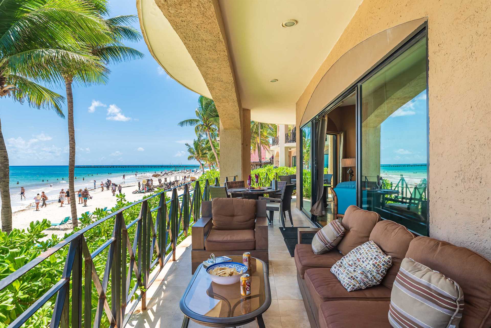 Extra large balcony to dine, relax, people watch!